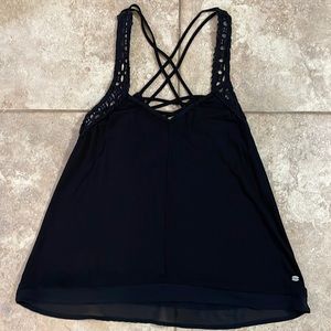 Black Sleeveless blouse with cotton lace macramé detail and lace hemline. Size S